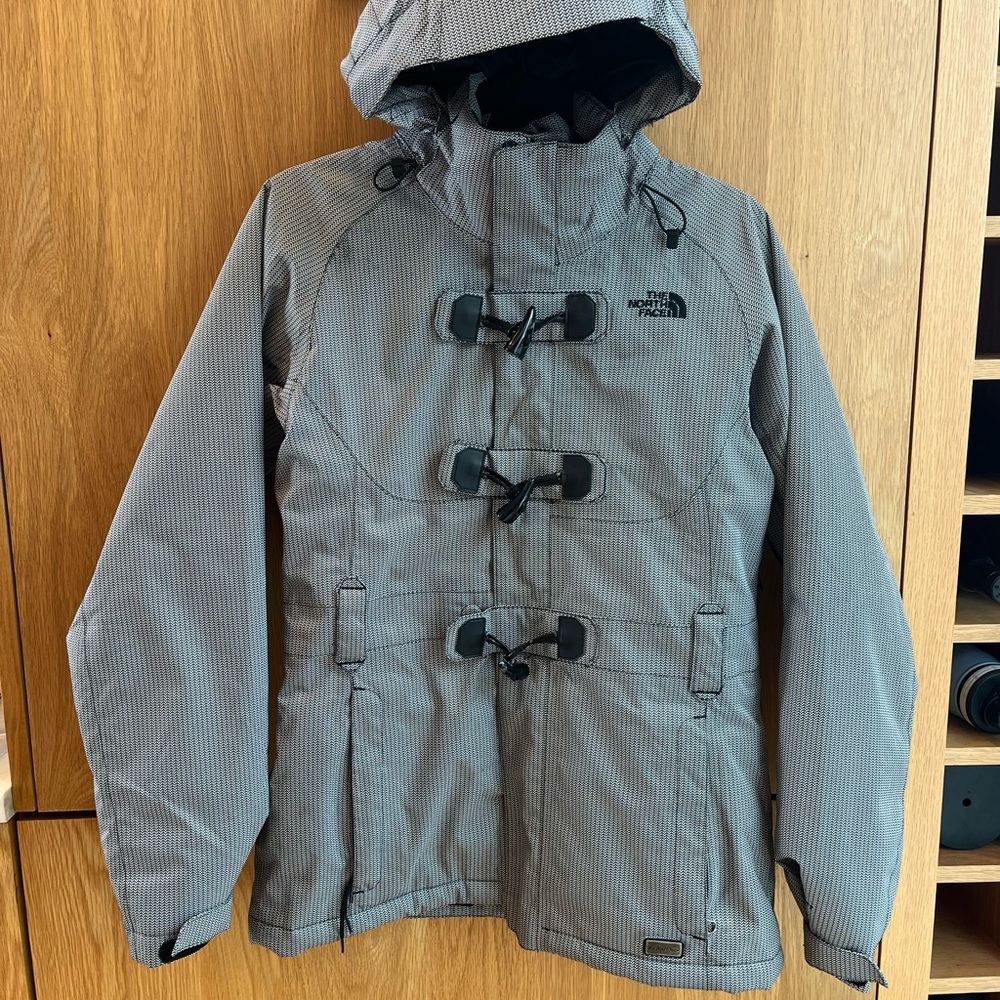 The North Face Navy and White  Ski Jacket with Hood and Weather-Resistant Fabric